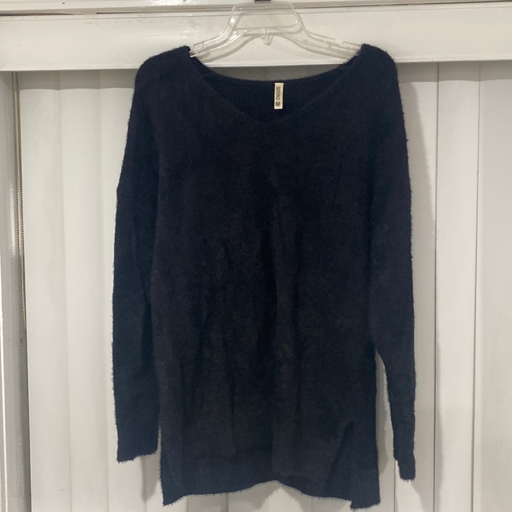 Black V-neck sweater